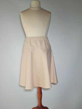 Børnenederdel med gule mælkestriber